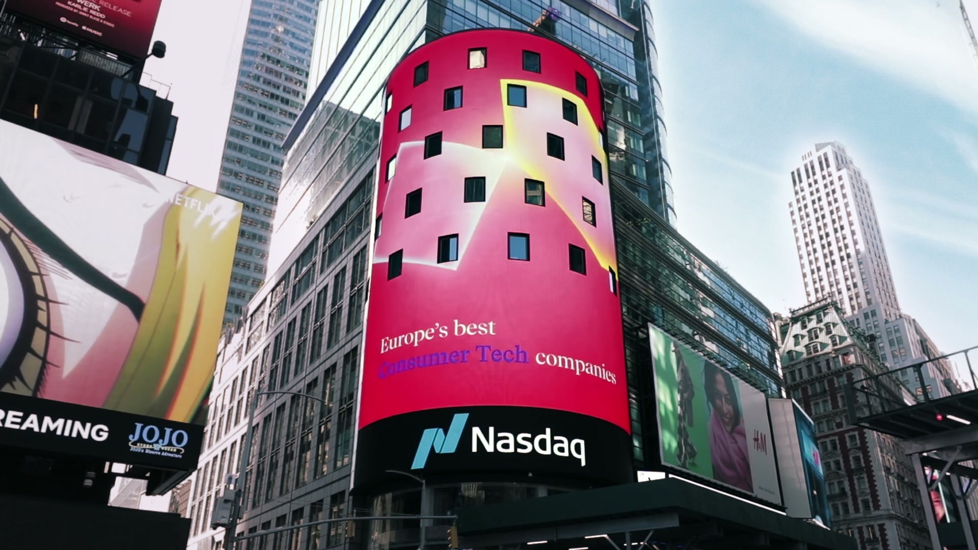 Red Molten visual wrapper displayed across the Nasdaq Times Square tower